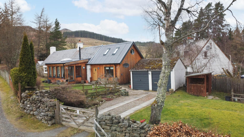 Front Elevation, Drive And Garage And Gardens