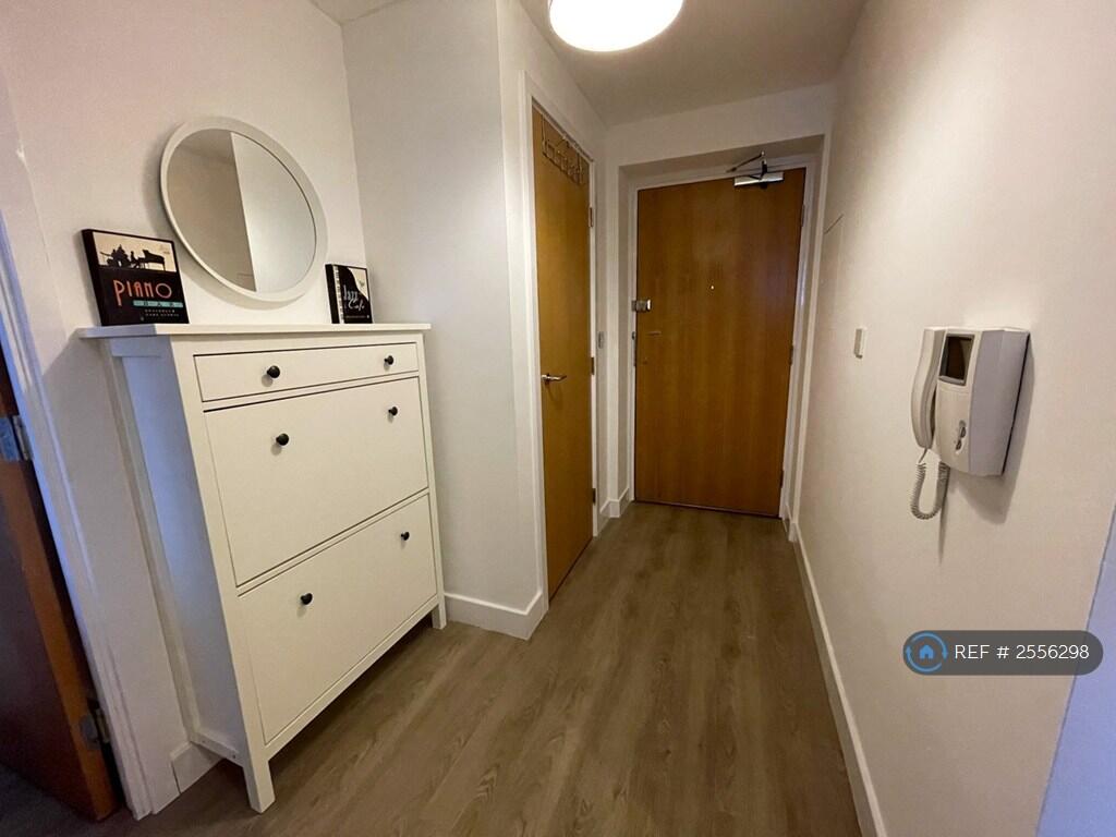 Shoe Cabinet Installed To Keep Hallways Clear