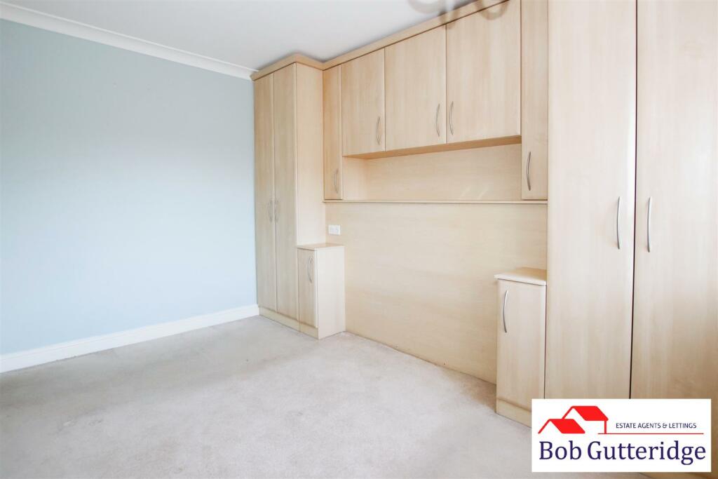 BEDROOM ONE (REAR)