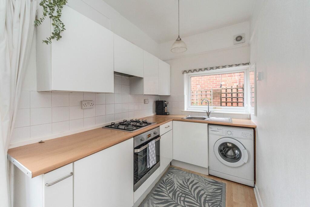SITTING ROOM AND KITCHEN