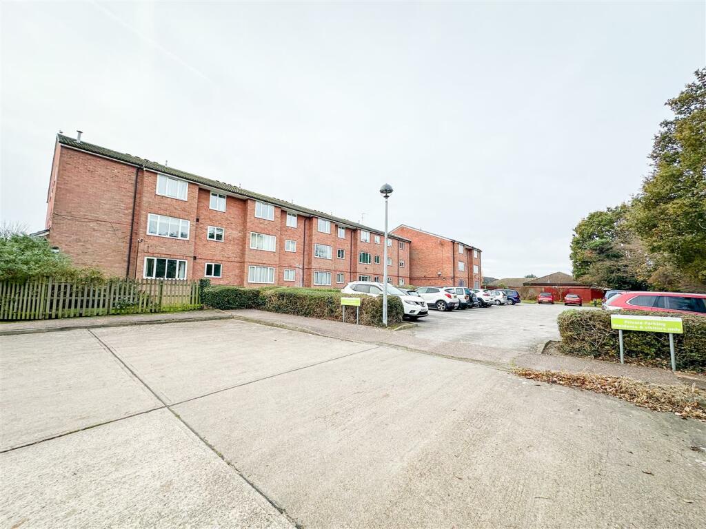 COMMUNAL PARKING AND GARDEN AREAS