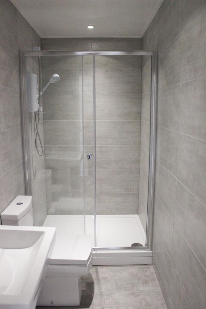 Modern bathroom with a clean, minimalist design...