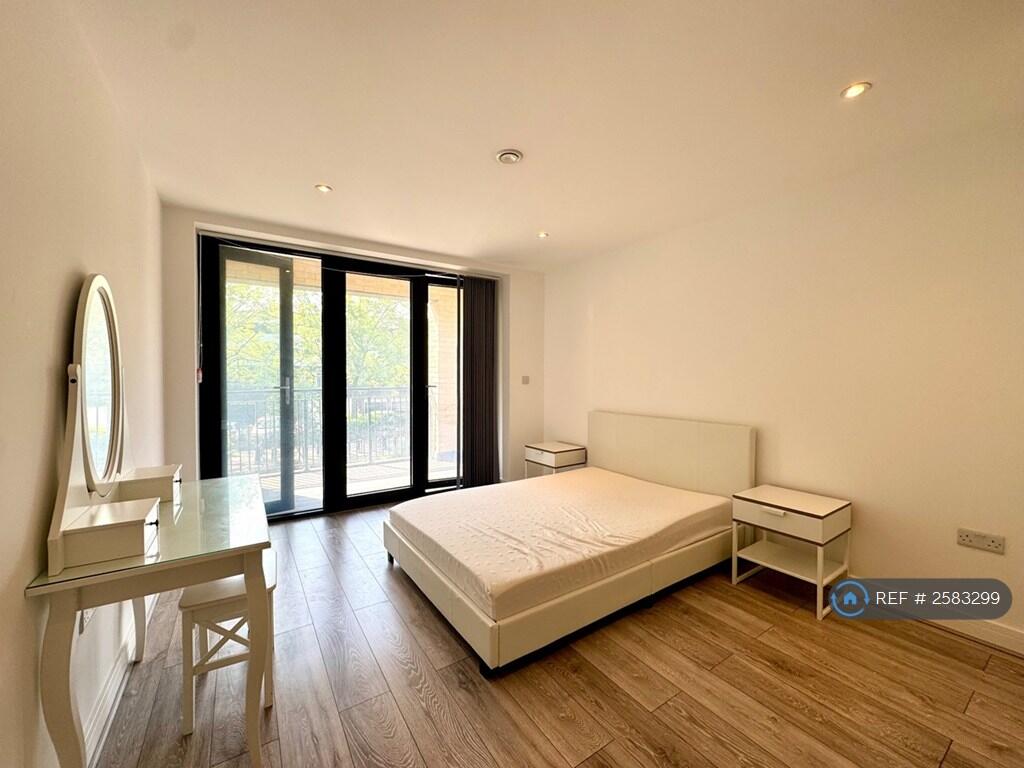 Large Bedroom Leading Out To Balcony