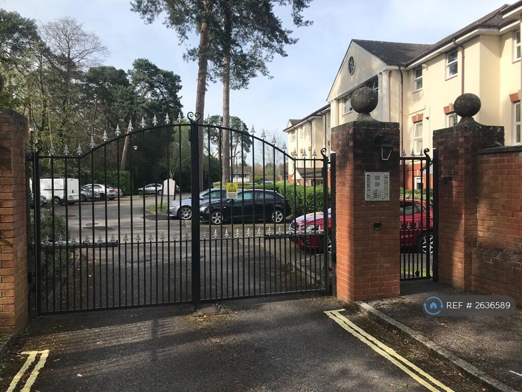 Electric Gated Main Entrance And Large Car Park