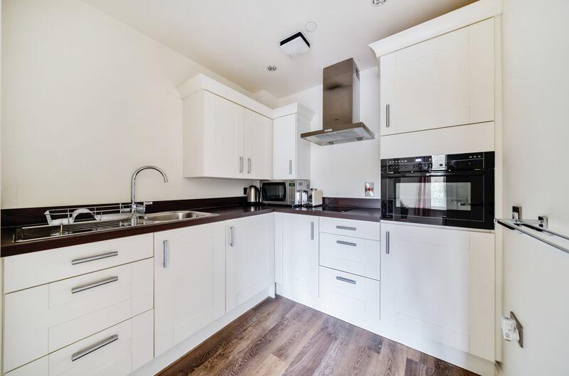 Kitchen with built-in appliances