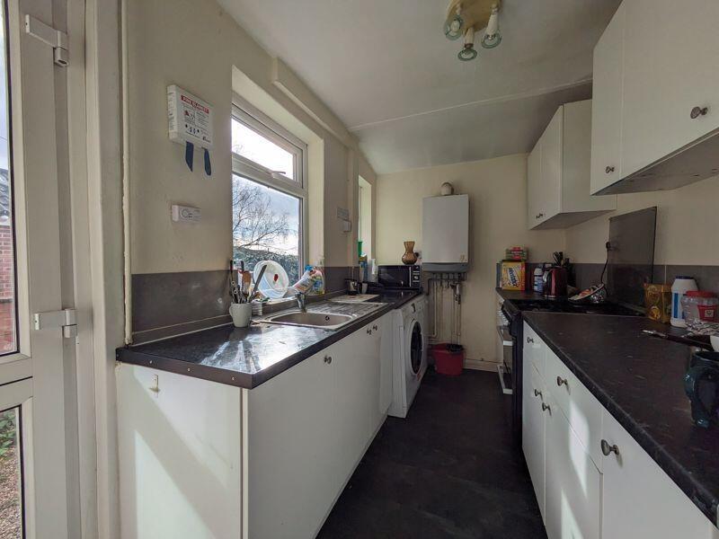 Bright and functional kitchen featuring modern ...