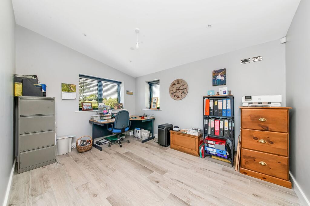 HOME OFFICE/BEDROOM FIVE/FAMILY ROOM