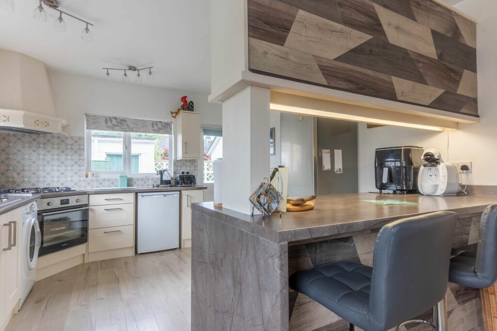 KITCHEN, DINIING AND LIVING SPACE