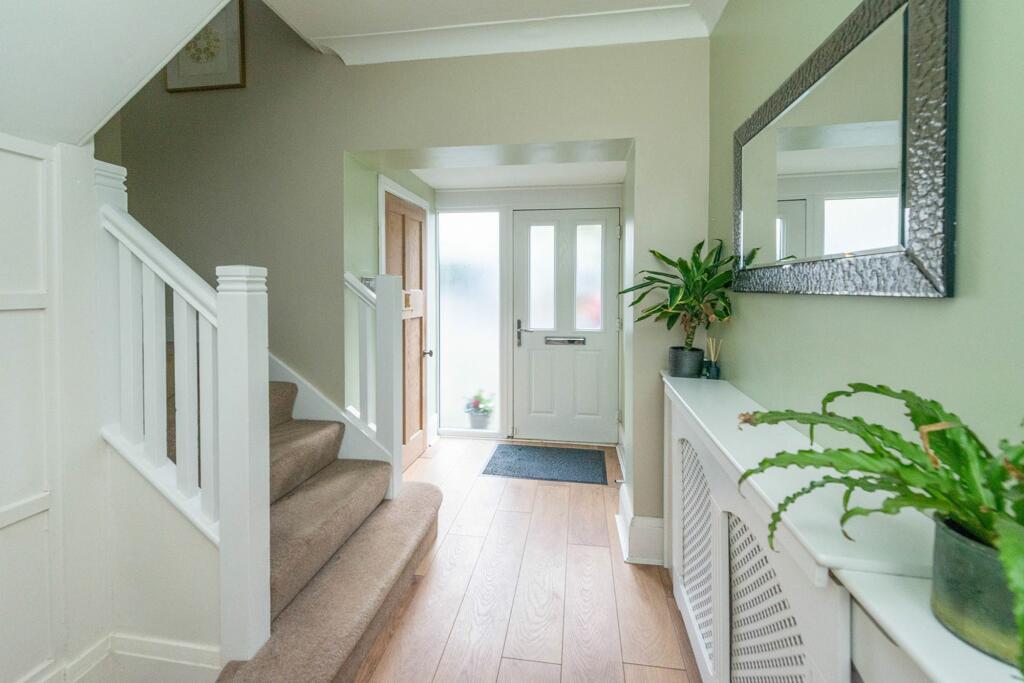 ENTRANCE HALLWAY AND STAIRWAY