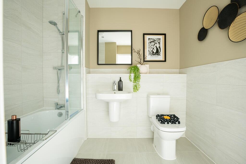 A family bathroom completes the first floor