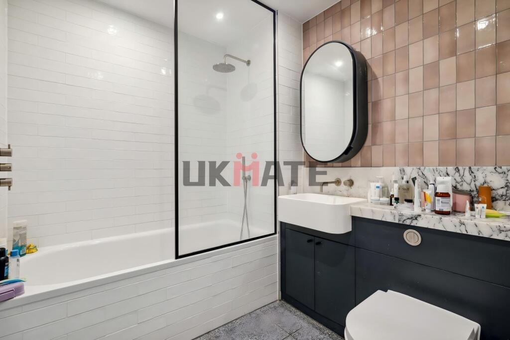 Modern bathroom with a spacious shower area, la...