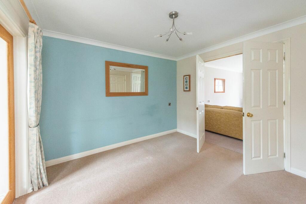 SITTING ROOM AND EXTENDED DINING KITCHEN