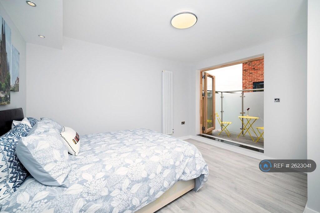 Bedroom With Balcony Access