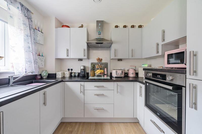 Kitchen with built-in appliances