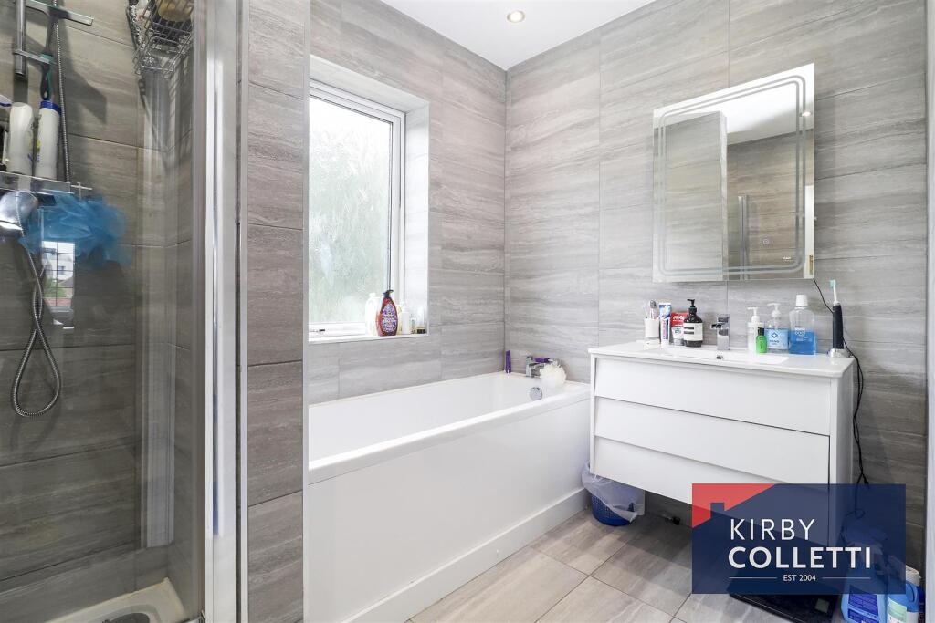 RE-FITTED BATH/SHOWER ROOM