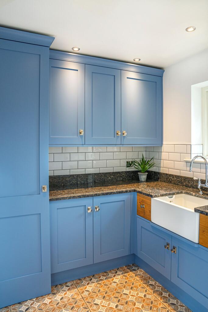 Laundry Room with fitted cuboards and belfast sink