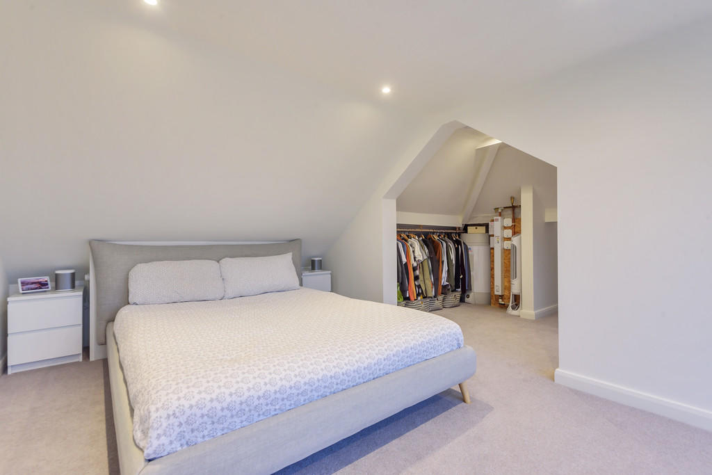 Bedroom with adoi...