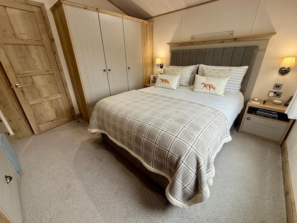 Bedroom 1 with ensuite shower &amp; storage