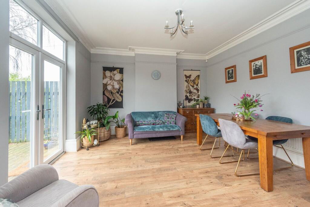 SITTING ROOM AND DINING KITCHEN