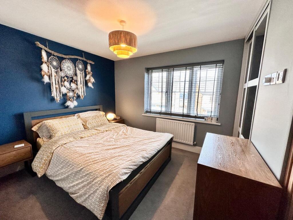 PRIMARY BEDROOM ONE
