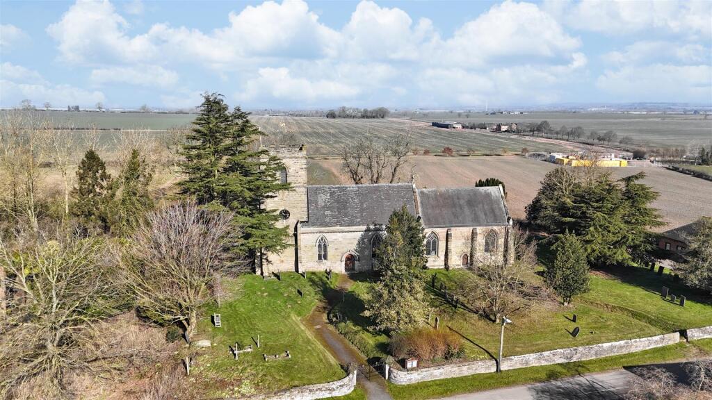 DRONE WITH CHURCH.jpeg