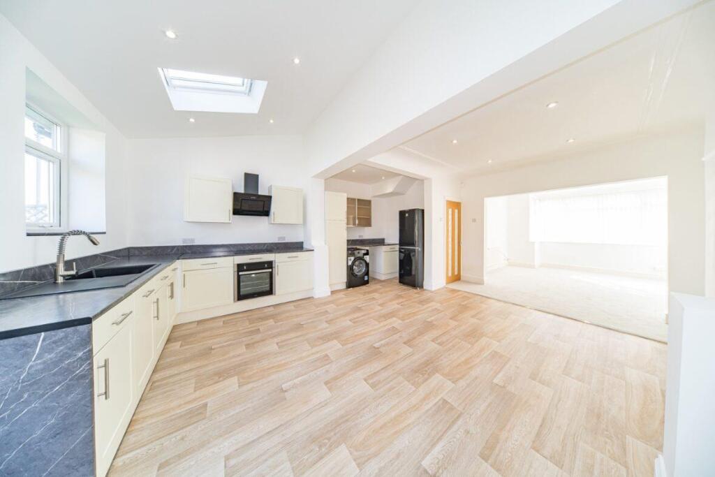 77 Jeffereys Crescent kitchen and lounge.jpg