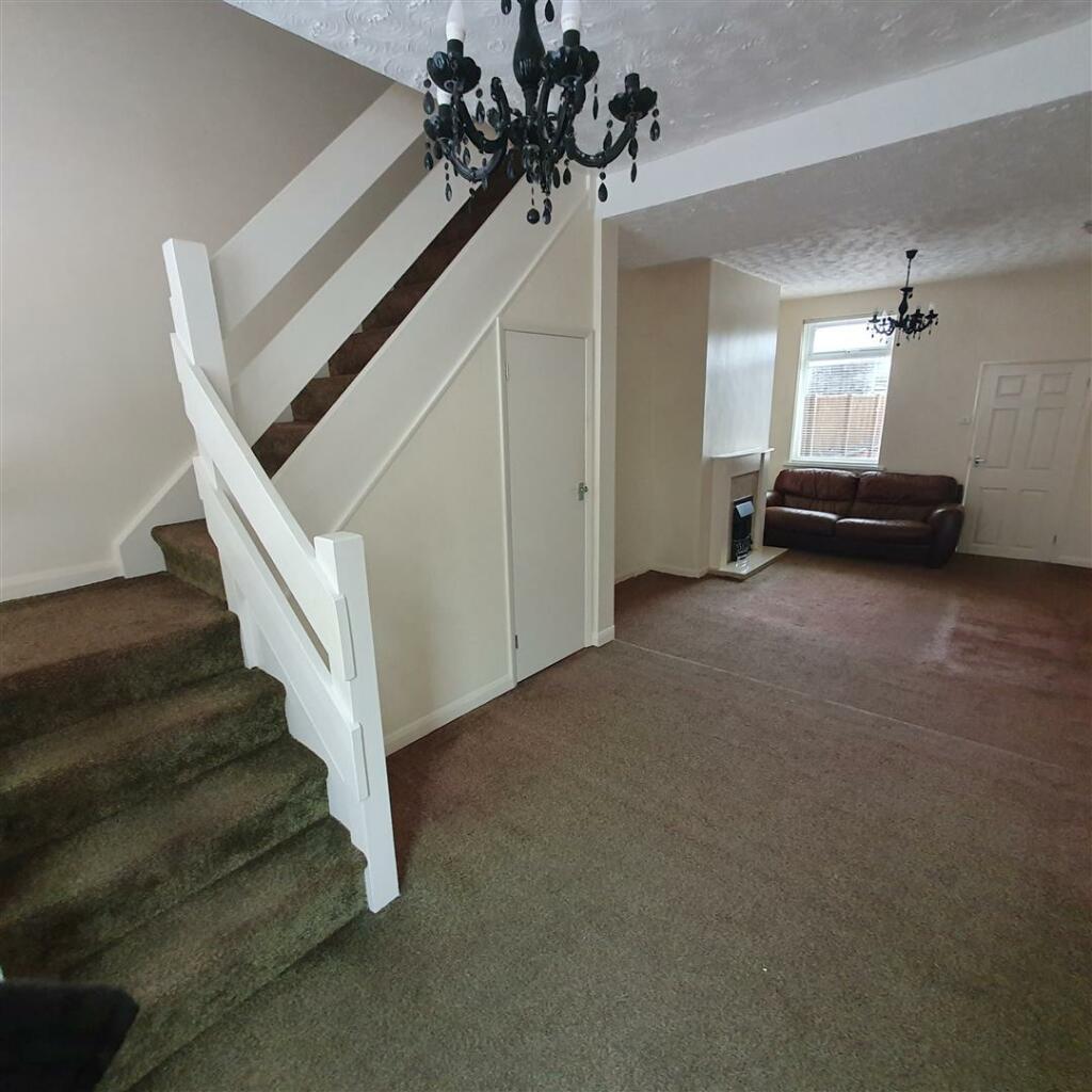 THROUGH LOUNGE/DINING ROOM