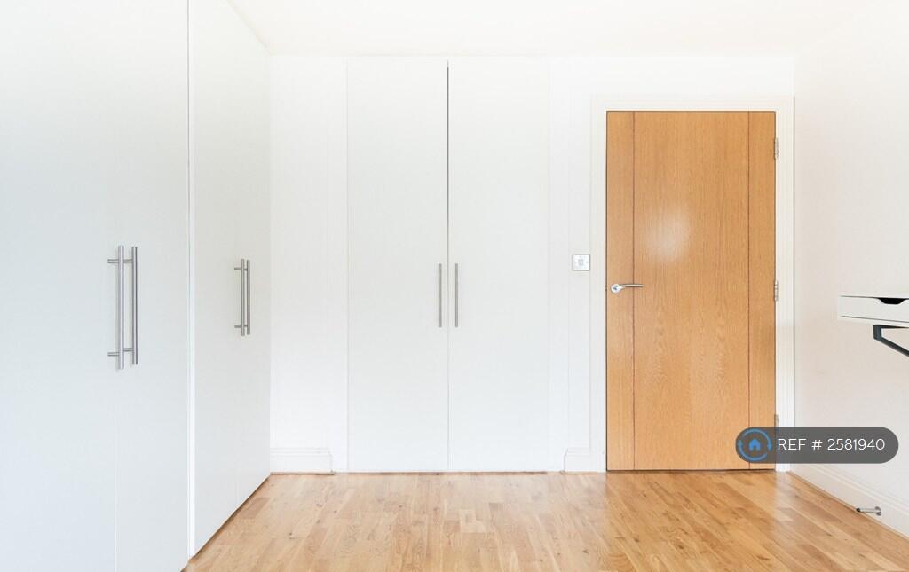 Large Bedroom With a Spacious Built-In Wardrobe