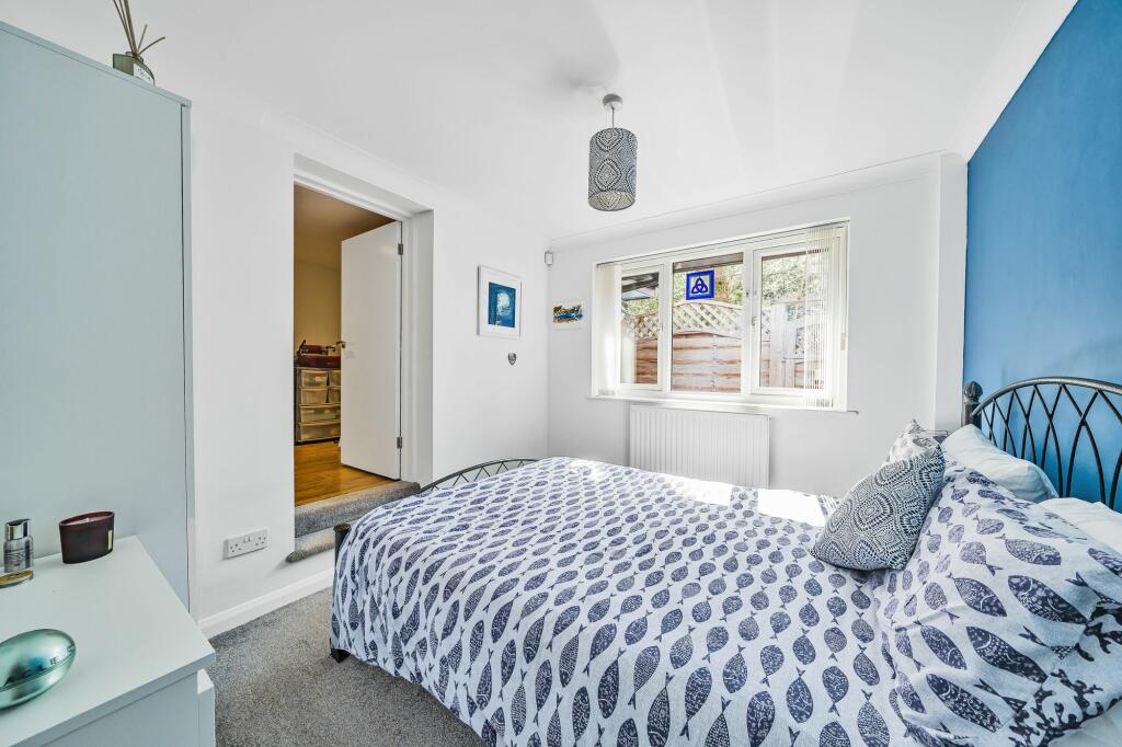 Bedroom two into bedroom four/hobbies room/bedroom four