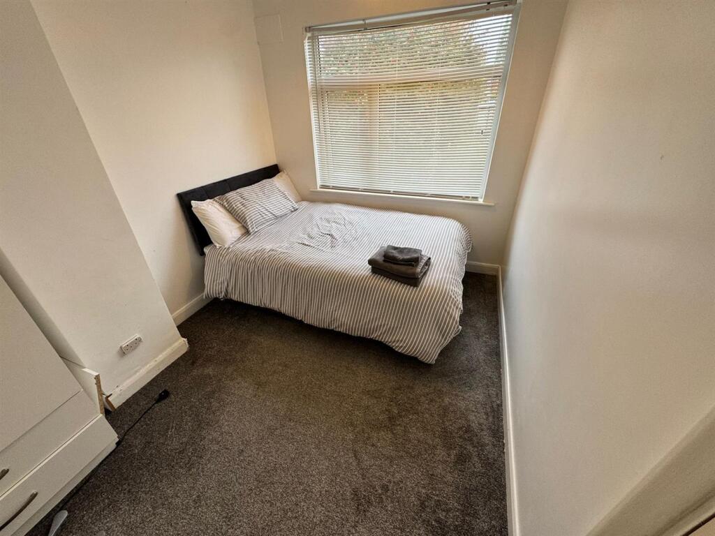 BEDROOM (REAR &amp; FIRST FLOOR)