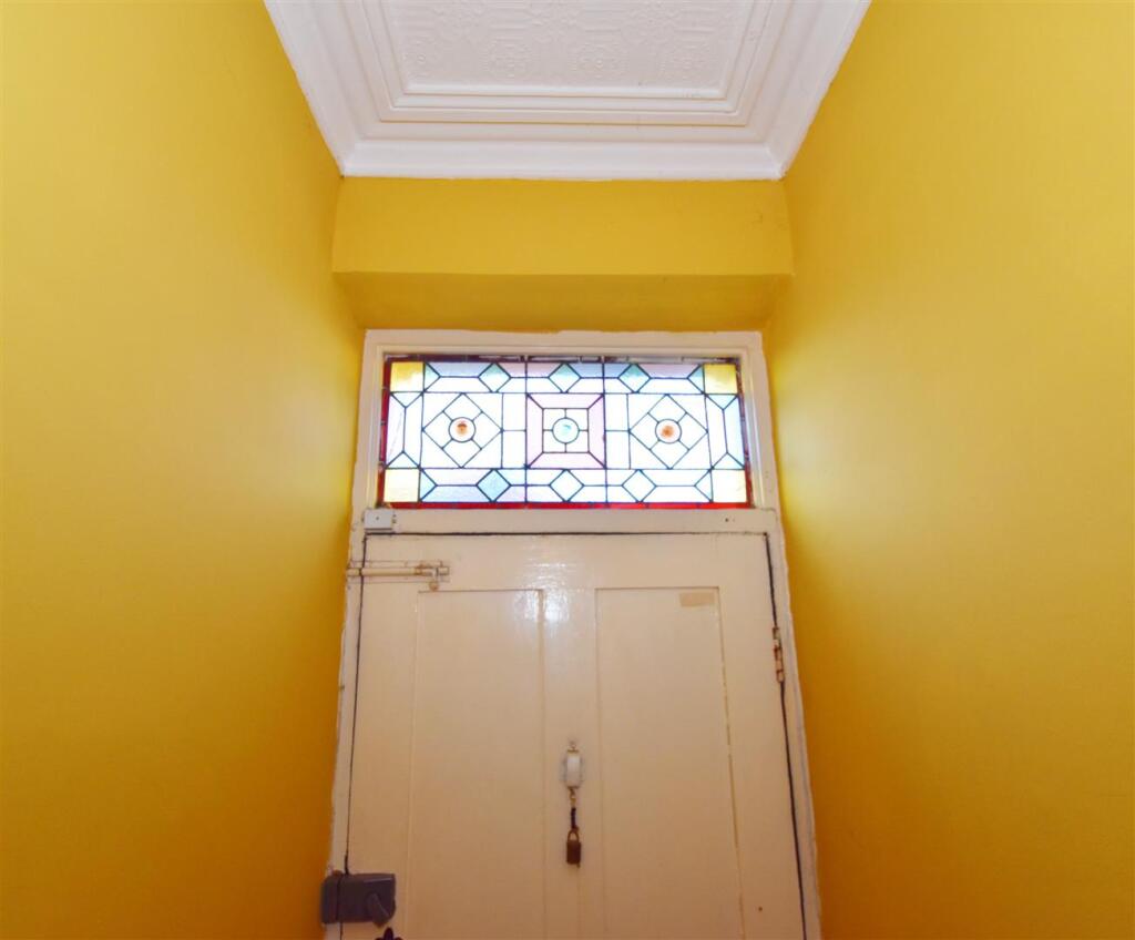 Period stained glass and coving.jpg