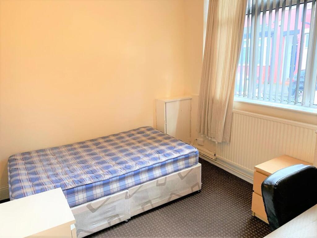 Bright and inviting double bedroom featuring a ...