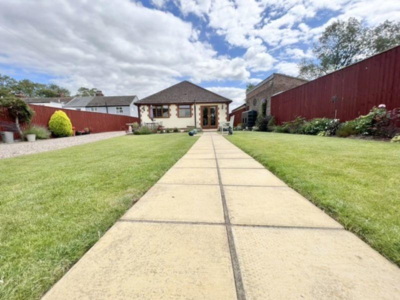 Path back to rear elevation