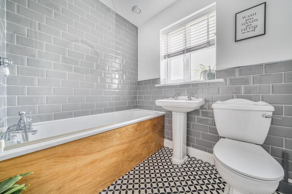 BATHROOM with separate SHOWER over bath.jpg