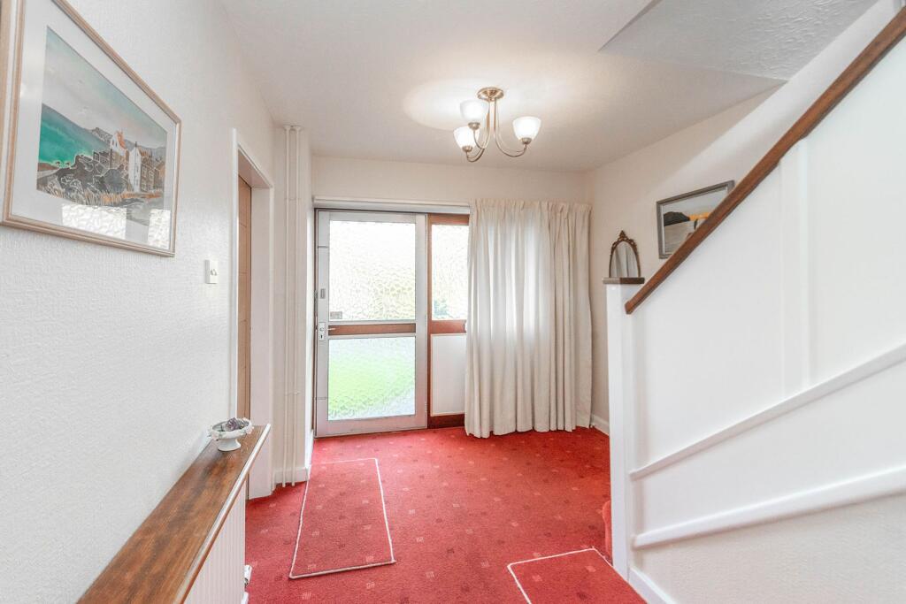 ENTRANCE HALLWAY AND LANDING