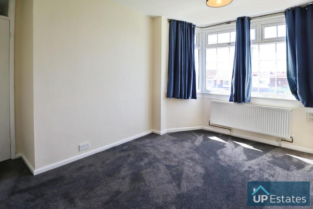 FIRST BEDROOM