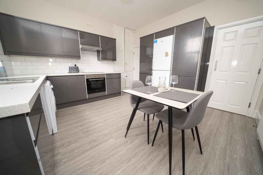 A modern and well-maintained kitchen featuring ...