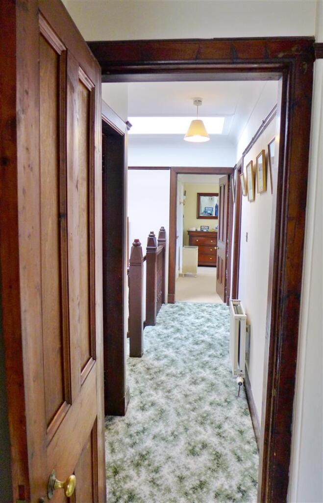 Upper hallway from bedroom 3 to main bedroom