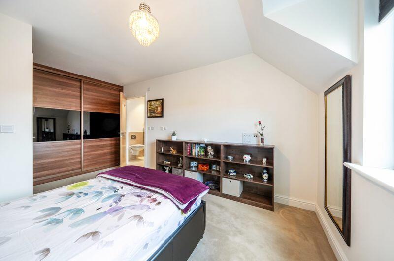 Bedroom with fitted wardrobe and ensuite