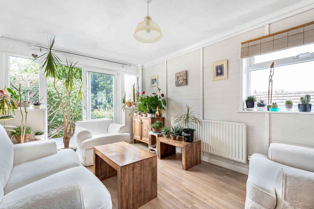 Living room with patio doors onto decking