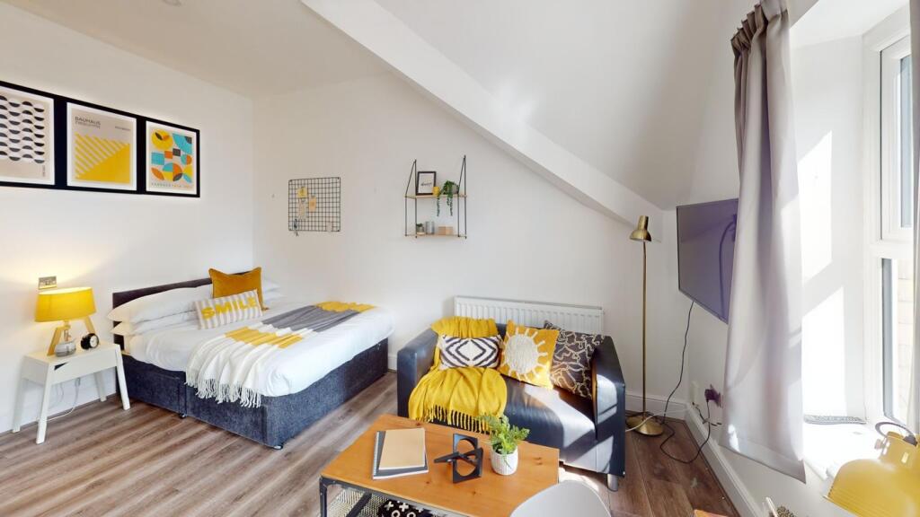 A spacious and inviting large double bedroom, b...