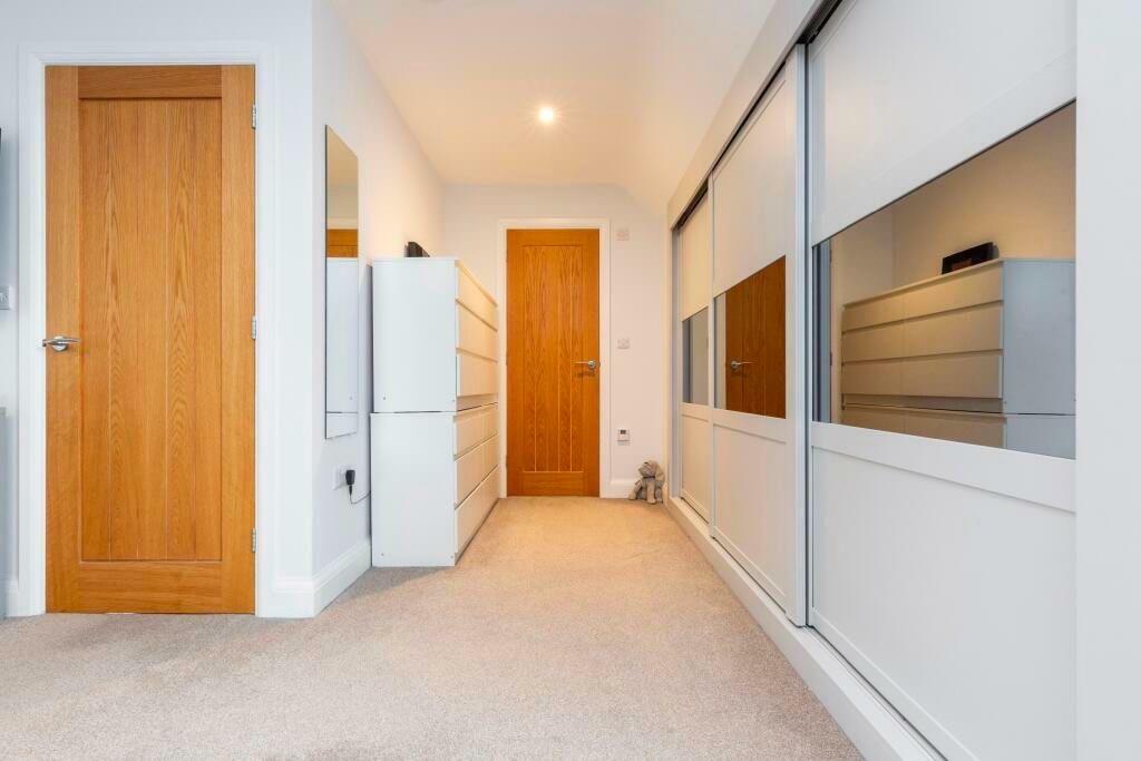 Bedroom 1 wardrobes.jpg