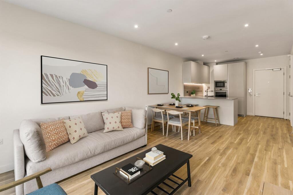 Experience urban elegance in this chic apartment living area, perfect for modern lifestyles.