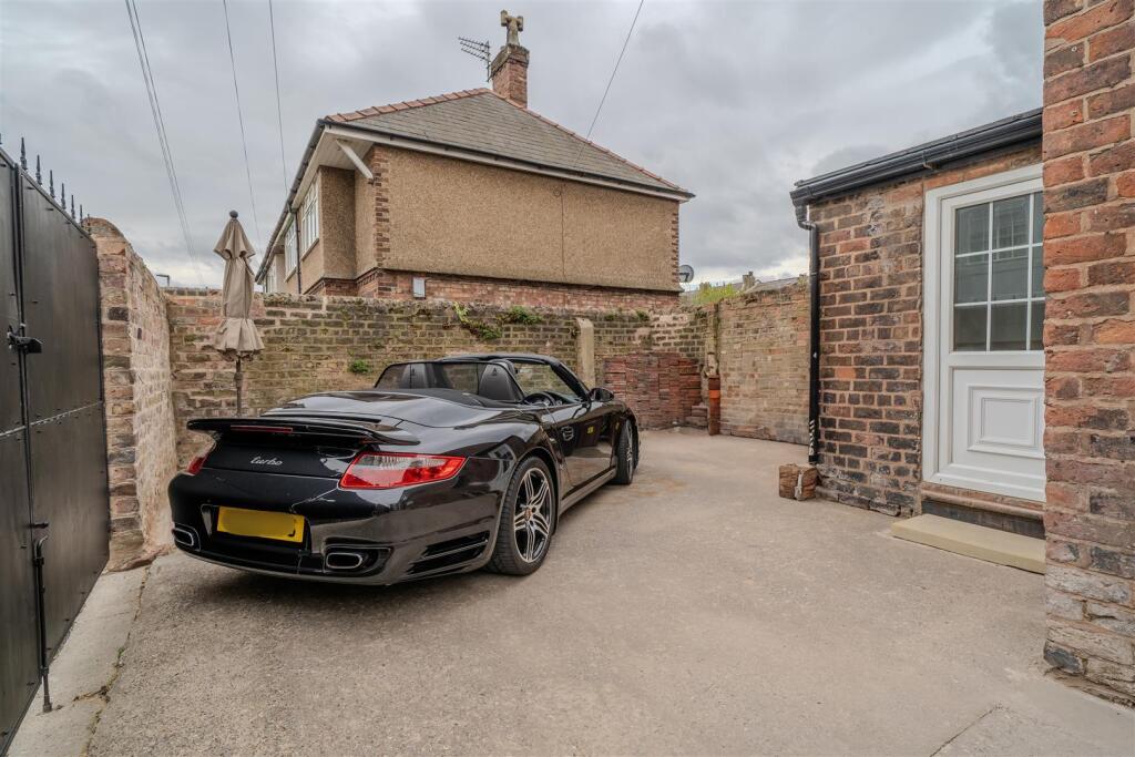 Private courtyard providing car access