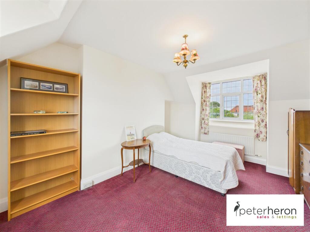 Bedroom 2 (front and rear)