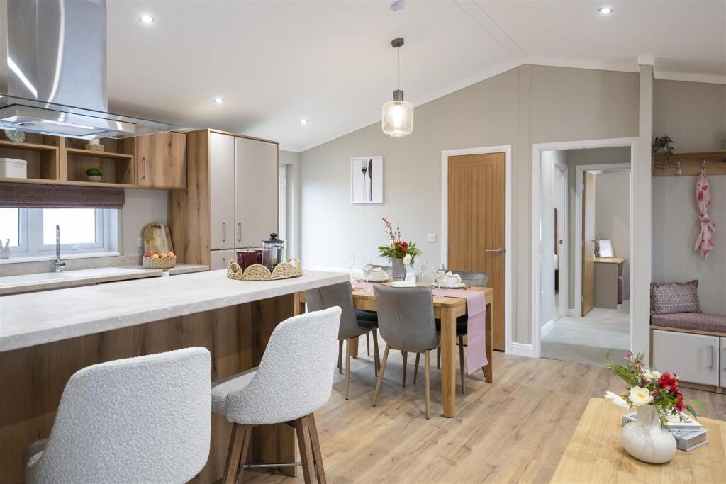 ALTERNATE VIEWS OF KITCHEN &amp; LIVING AREA
