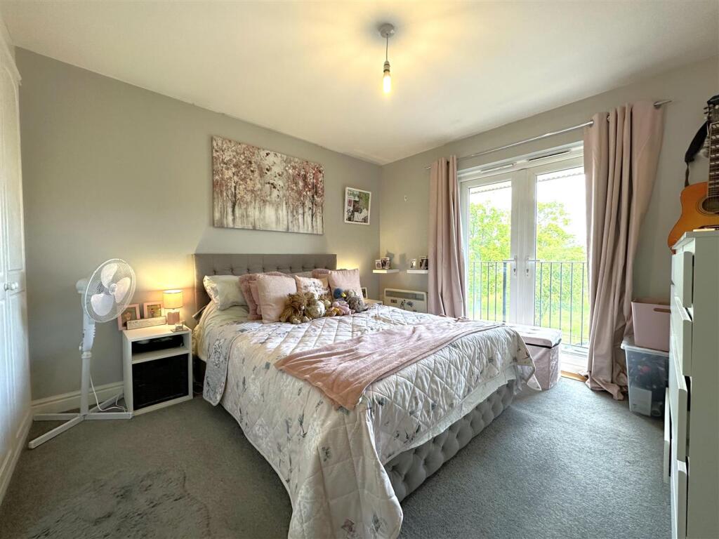 Master Bedroom With French Doors 018