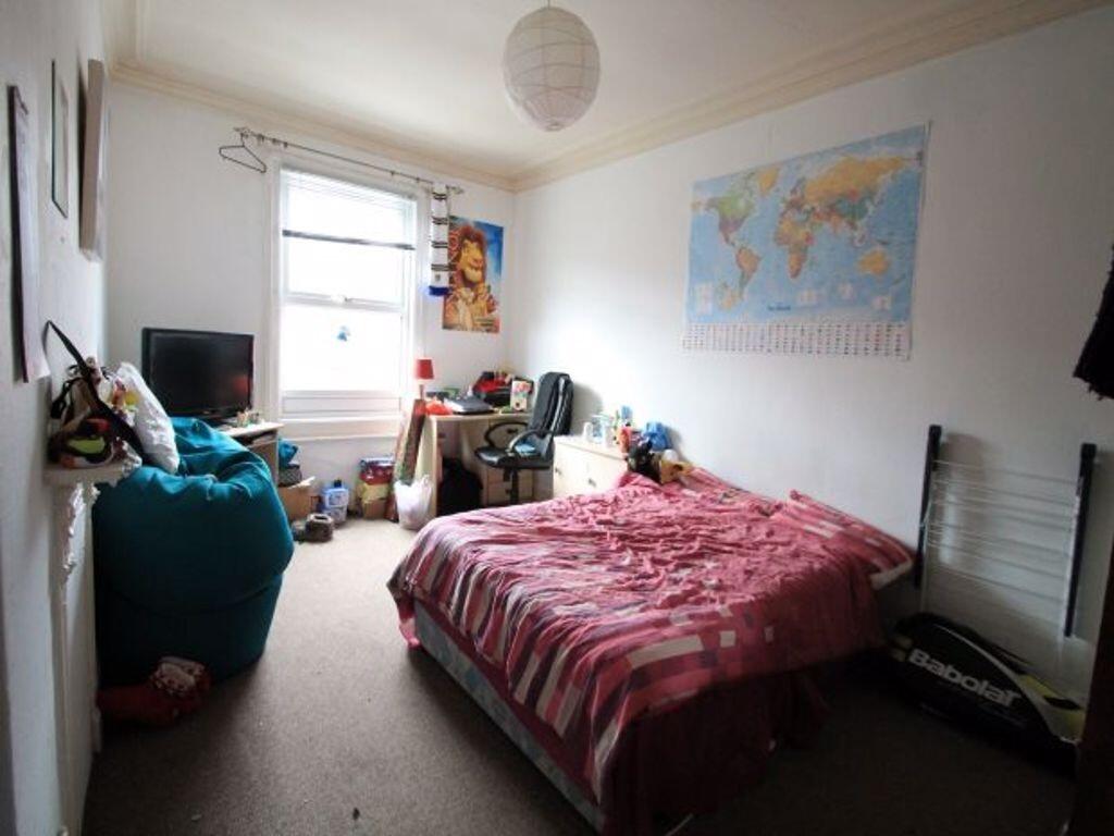 Bright and cozy double bedroom featuring a comf...