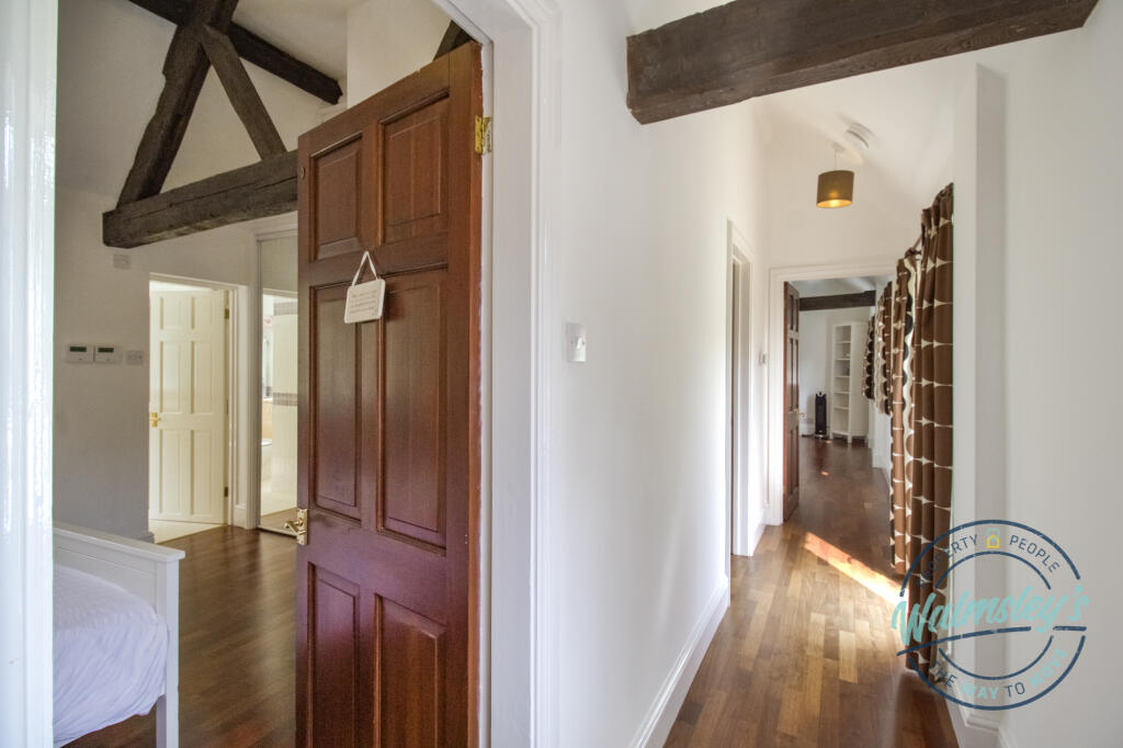 Hallway within bedroom wing