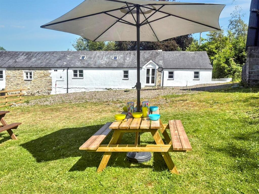 Front view of property and garden